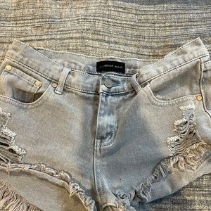 mustard seed distressed jean shorts.